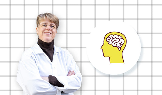 Dr. Elin Östman med en symbol som visar en människa och en hjärna